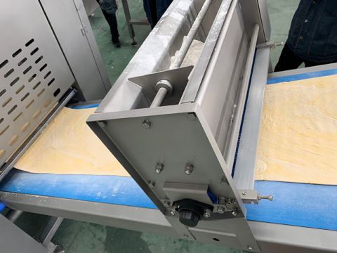 موزع الطحين