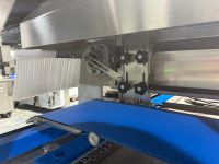 ماكينة ترتيب الصواني (نظام الترصيص الآلي)